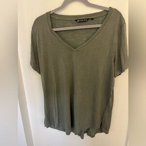 Athleta short sleeve army green t-shirt.  Size xl. Good condition.Slightly sheer